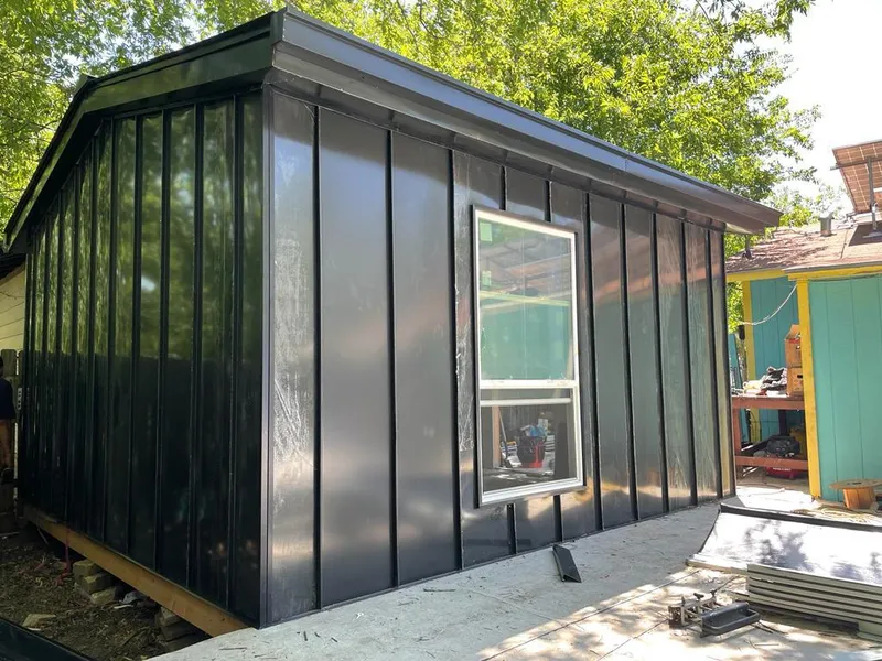 Black standing seam metal wall panels for Metal Roof Installation in North Elba