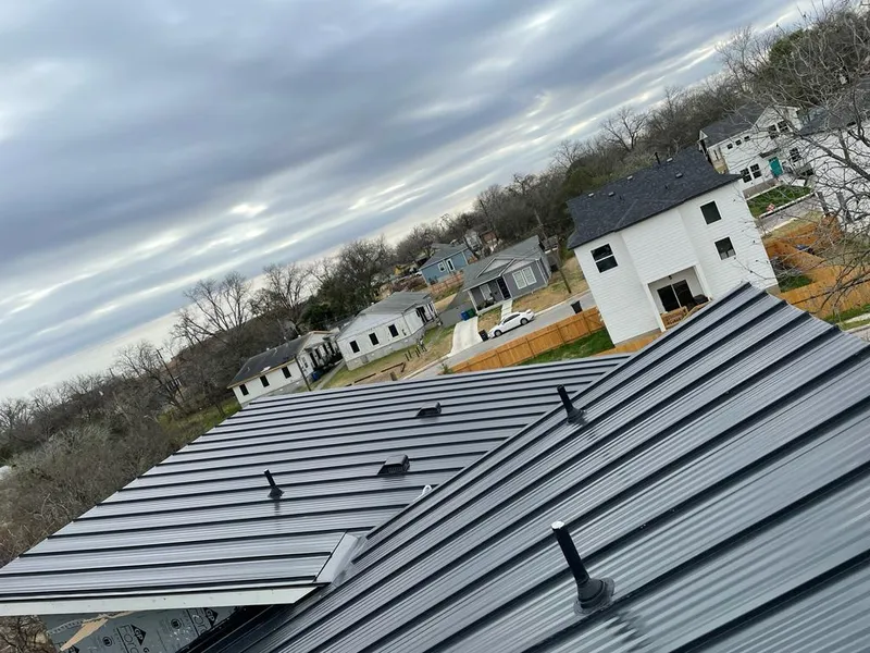 Standing seam metal roof panels with vents for Skylight Repair in North Elba